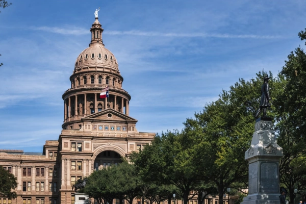 Texas Capitol building in Austin under a clear sky